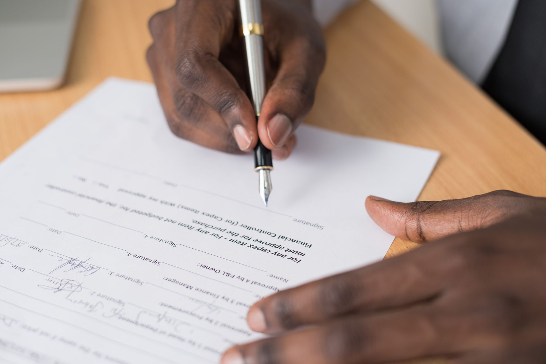 A pen over a document