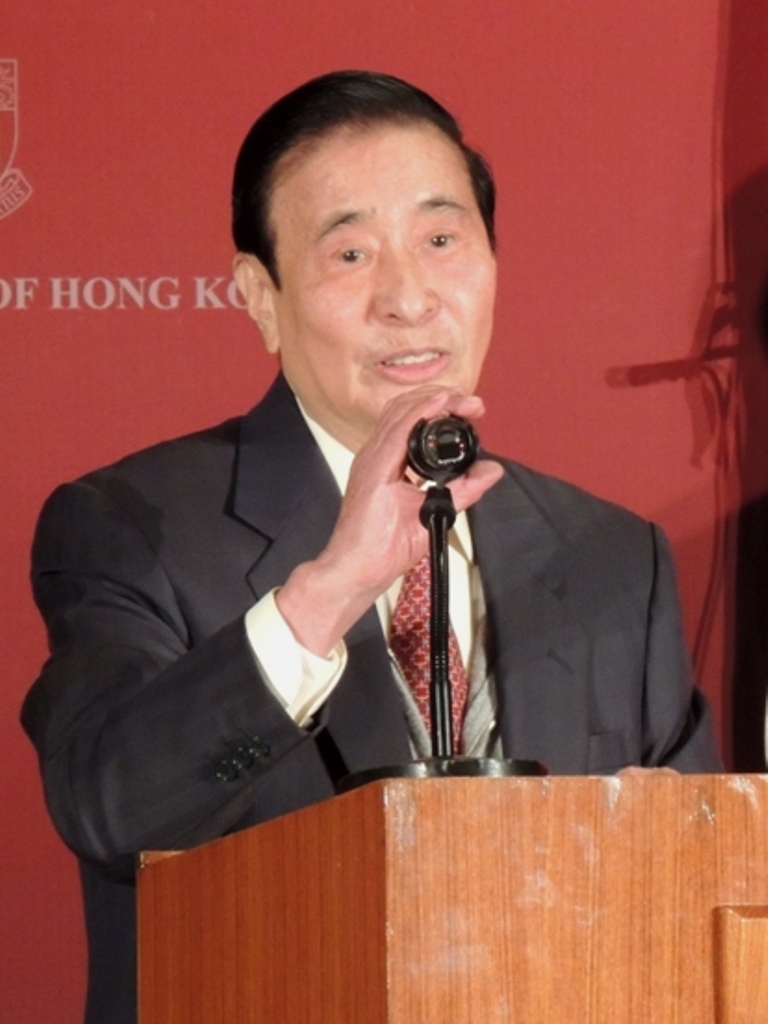 Lee Shau-kee, founder of Henderson Land, speaking at a lectern in Hong Kong on 6 January 2013