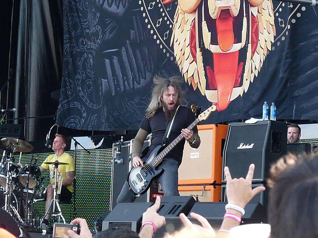 Mastodon performing at Sonisphere 2012 in Getafe, Madrid, under the band's own backdrop — the name and imagery that its co-founder's estate now says were used to sell an album he did not play on