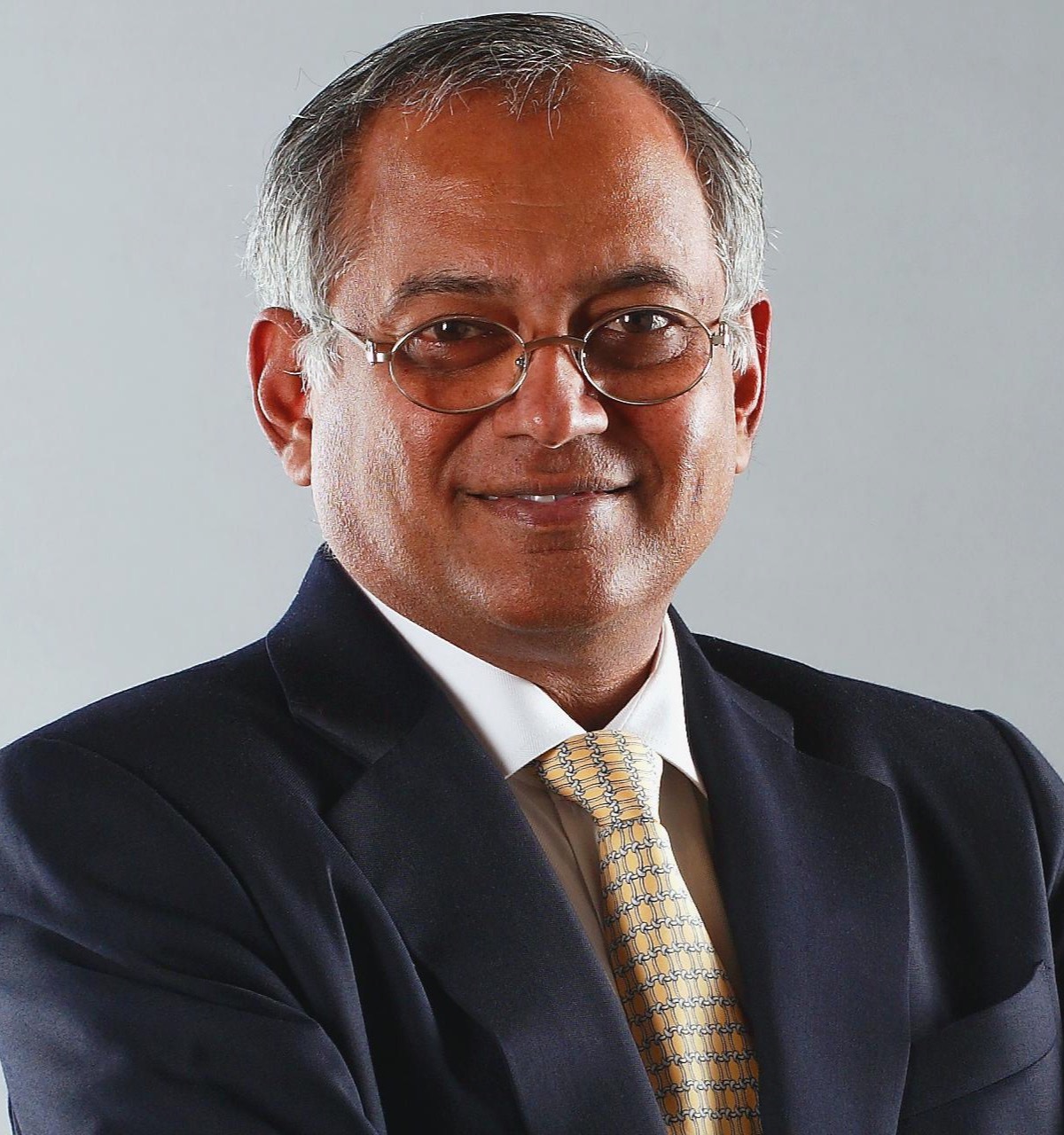 Venu Srinivasan, then chairman of TVS Motor Company, in 2011; he is sole trustee of the VS Trust that holds 66.55% of TVS Holdings